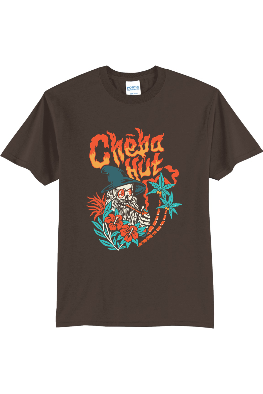 A brown short-sleeved t-shirt featuring a colorful graphic on the back depicting a wizard-like figure with a long white beard, a pointed hat, sunglasses, and a pipe, surrounded by flames, hibiscus flowers, and palm trees, with the 'Cheba Hut' logo above.