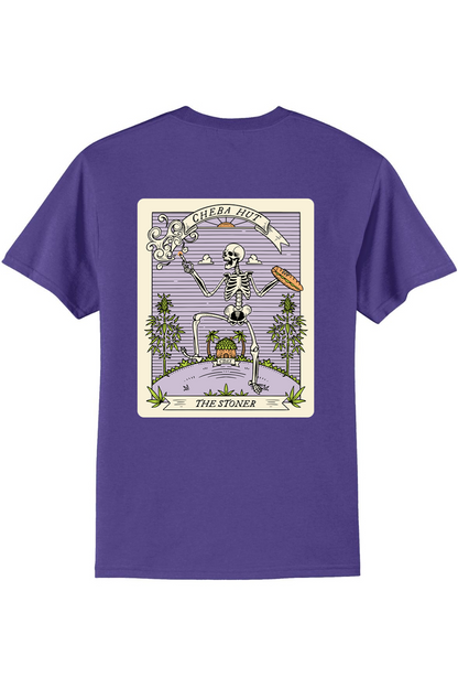 A purple short-sleeved t-shirt featuring a rectangular graphic on the back depicting a skeleton holding a smoking item and a sandwich, with 'CHEBA HUT' and 'THE STONER' text.