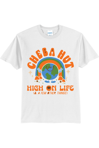 A white short-sleeved t-shirt featuring a retro-style graphic with a smiling Earth under a rainbow, palm trees, and the text 'CHEBA HUT' and 'HIGH ON LIFE (& A FEW OTHER THINGS)'.